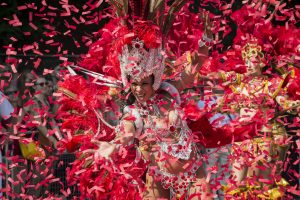 Beautiful Caribbean dancer takes part in the Notting Hill Carnival, annual event that is the largest in Europe.