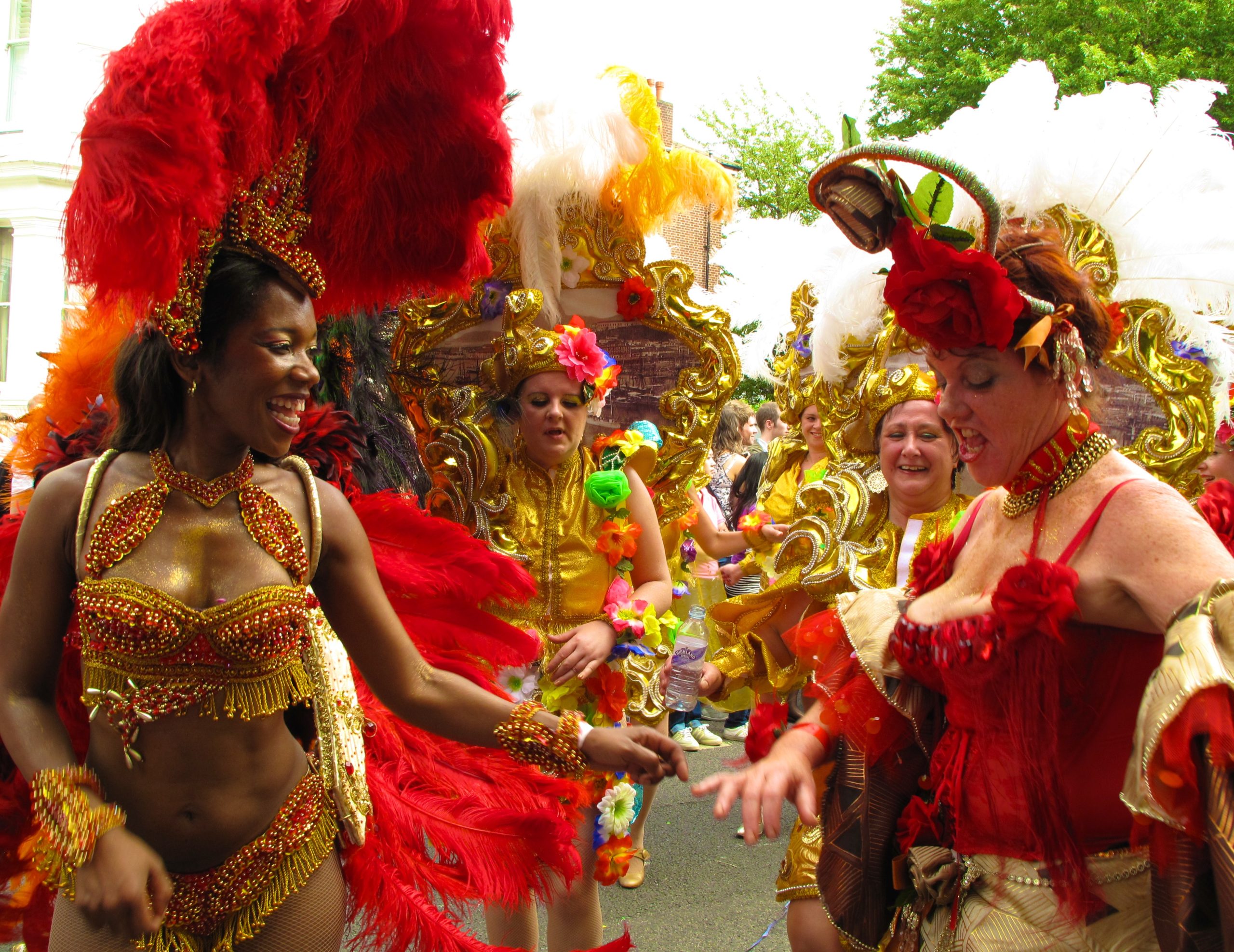 Performers in elaborate costumes parade through west London at the Notting Hill Carnival, one of the largest street festivals in Europe. The Caribbean-style Carnival is held during two days over the August bank holiday towards the end of every summer.