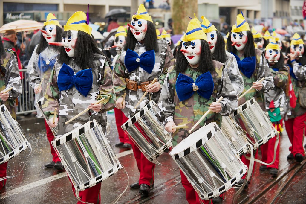 Unidentified people take part in Basel Carnival in Basel, Switzerland.