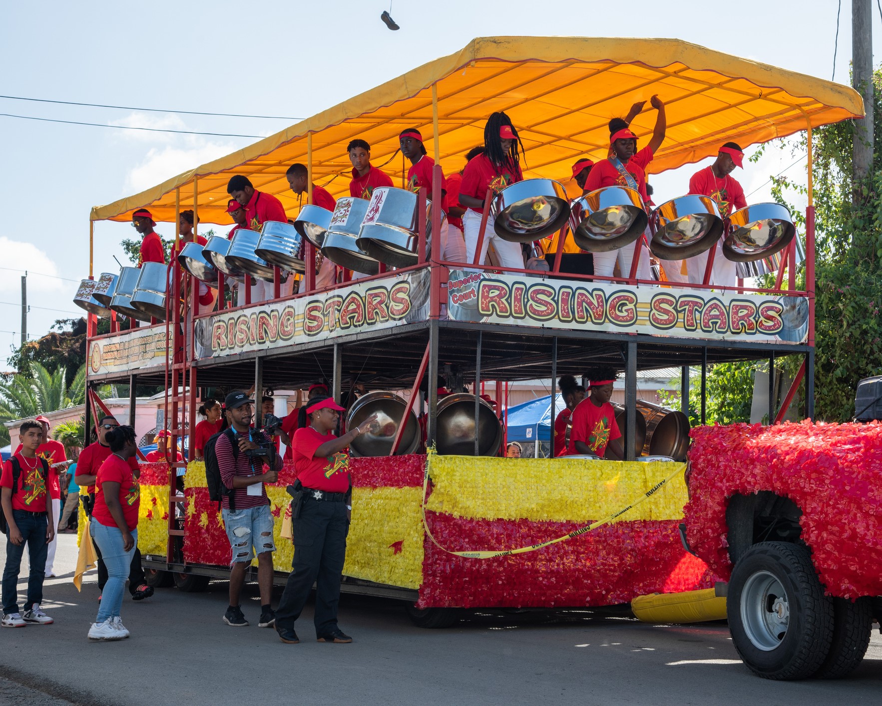 The Rising Stars steelpan band performing Carnival music on steel drums