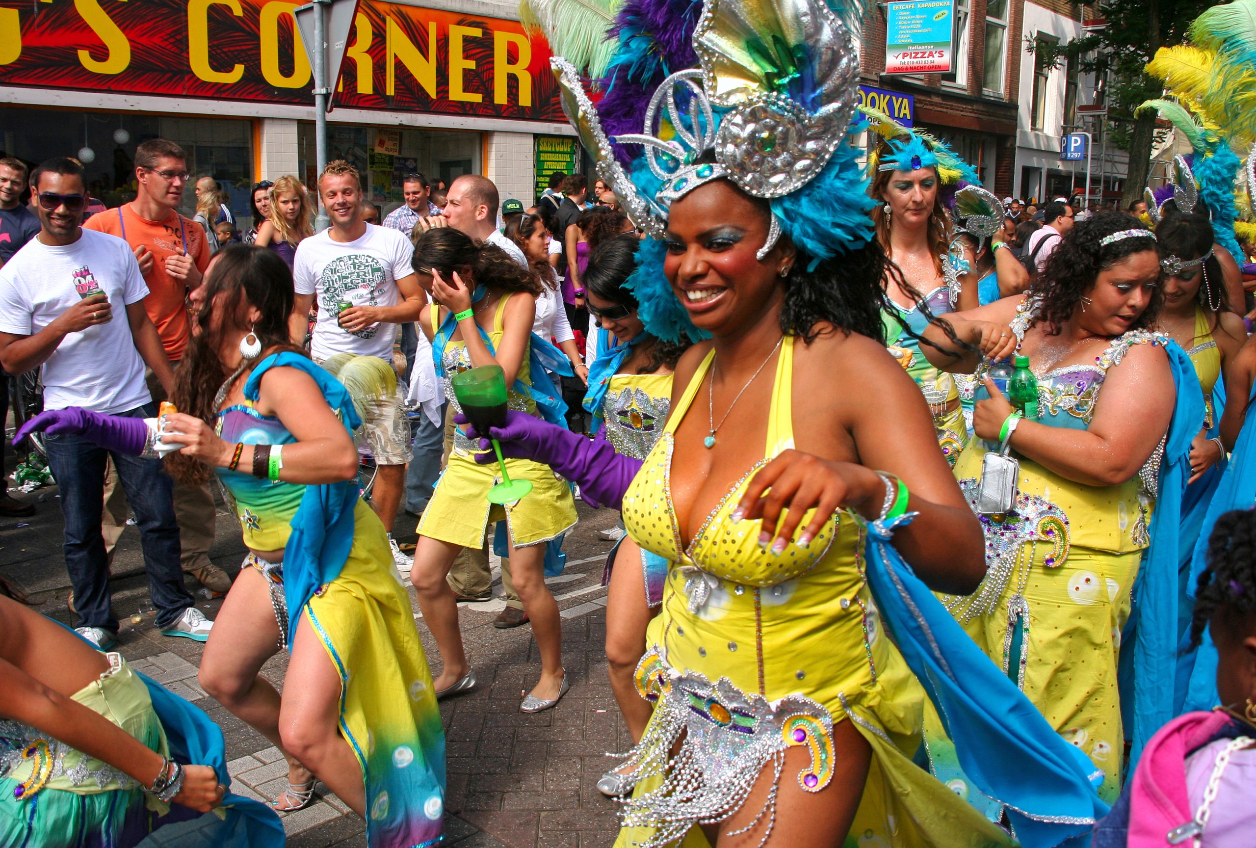 Colorfully dressed women participating in the Antillean Carnival pageant in Rotterdam, Holland on July 25, 2009