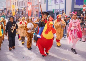 Carnival in Villach, Fasching, Participants in the annual parade wear colorful and masquerade clothing.