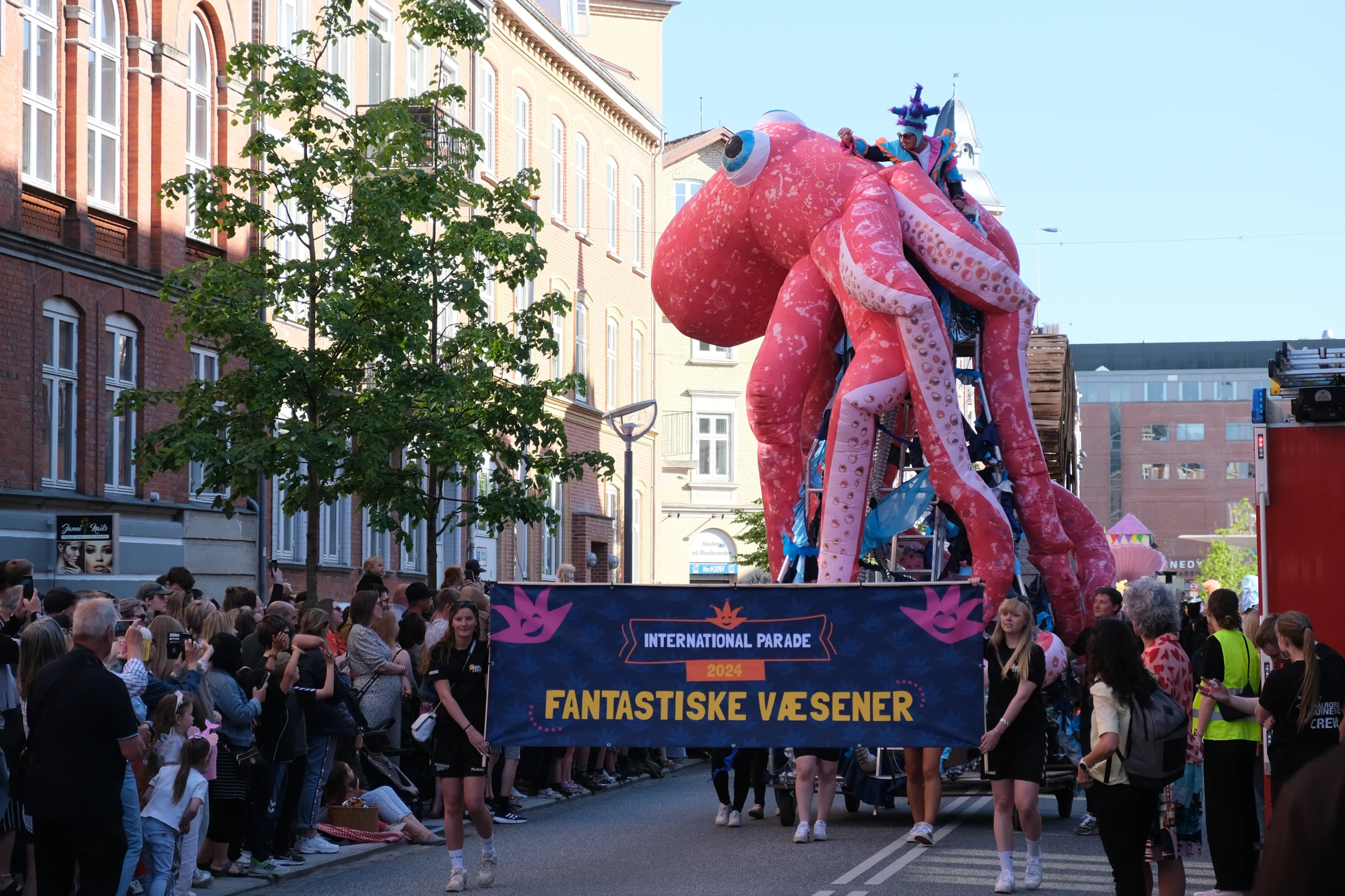 Giant pink octopus float leading the international parade at Aalborg Karneval