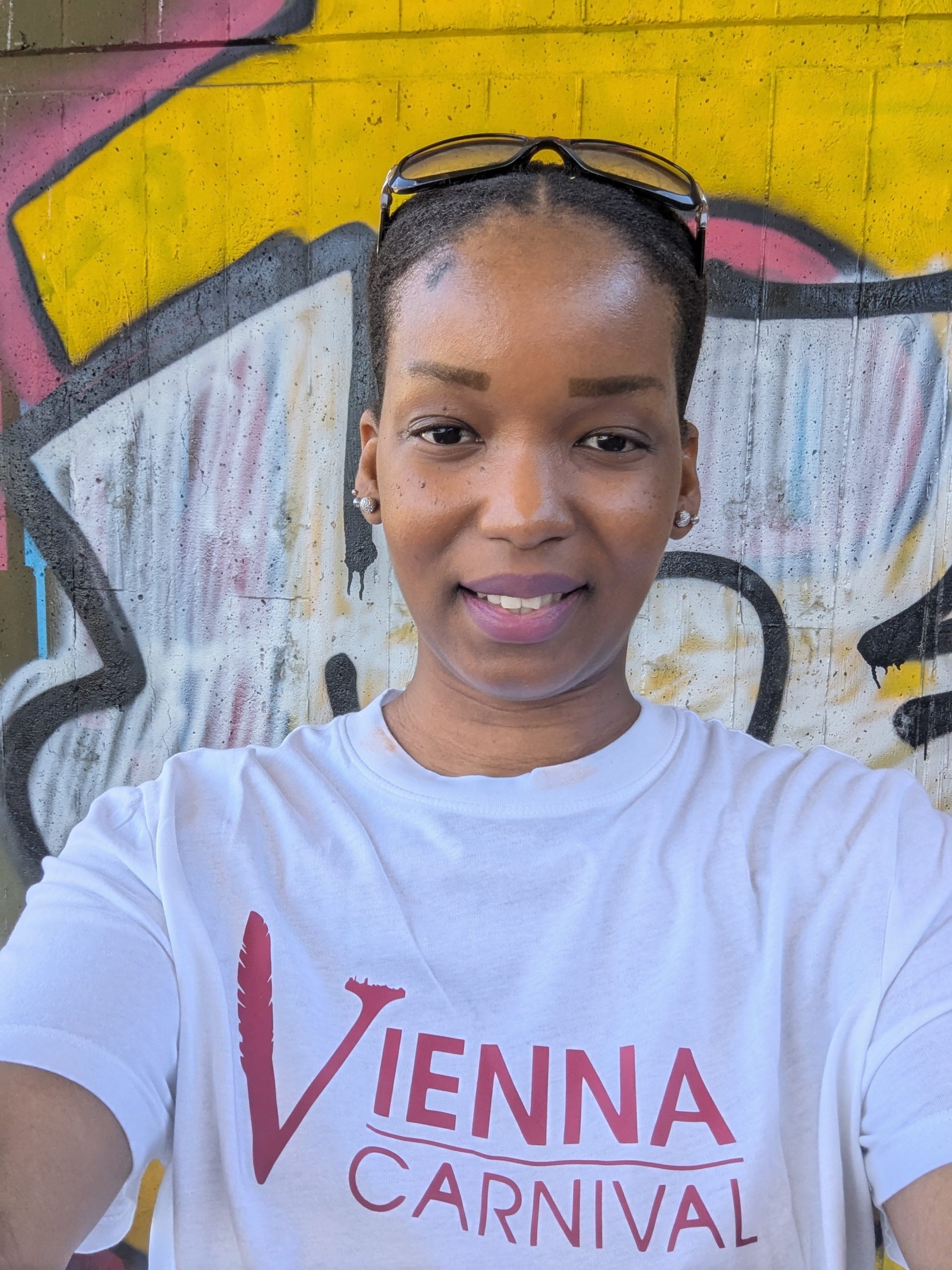 Author wearing a Vienna Carnival T-shirt featured in the blog “My 2025 Carnival Travel List,” highlighting personal carnival style and travel inspiration.