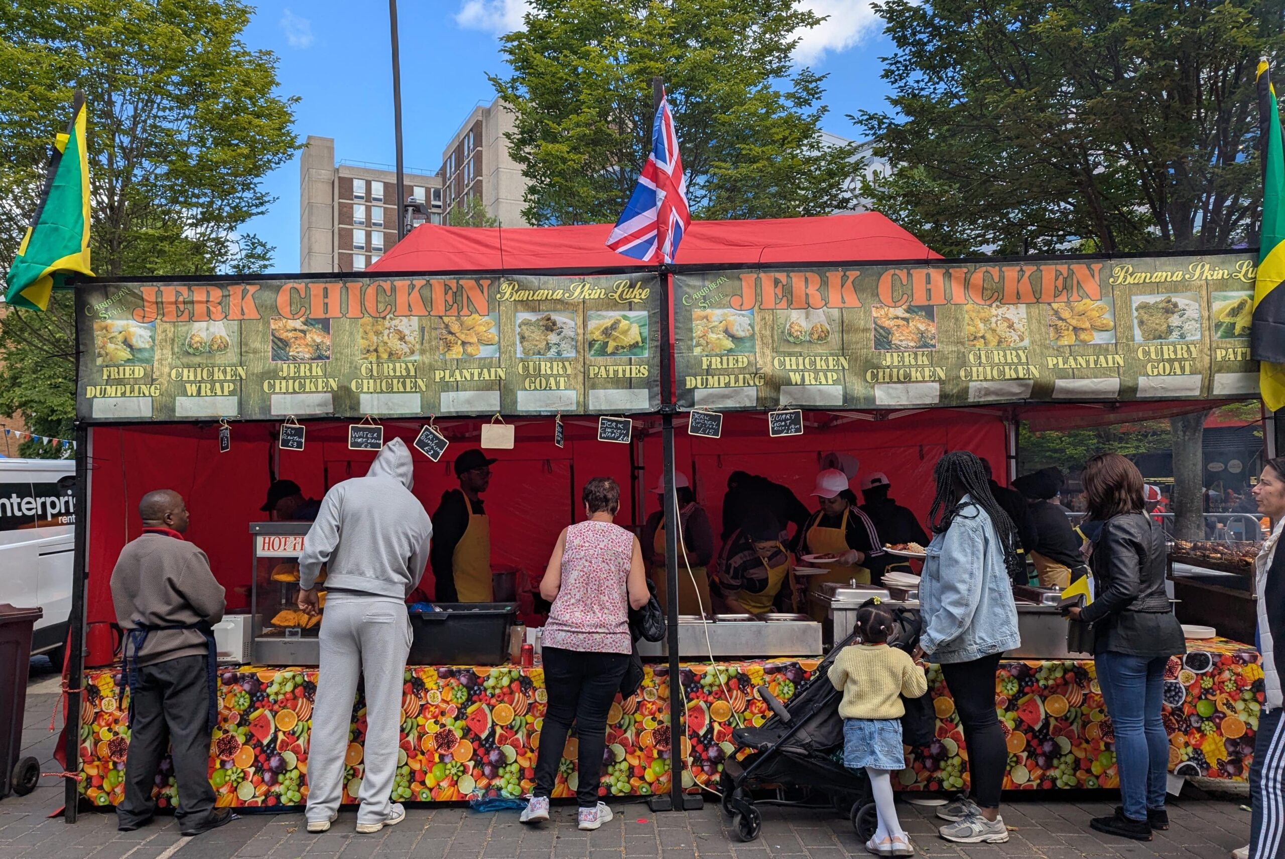 Jamaican food stall at the 2025 Luton International Carnival, serving traditional Caribbean dishes and flavors as part of the UK’s vibrant multicultural celebration.