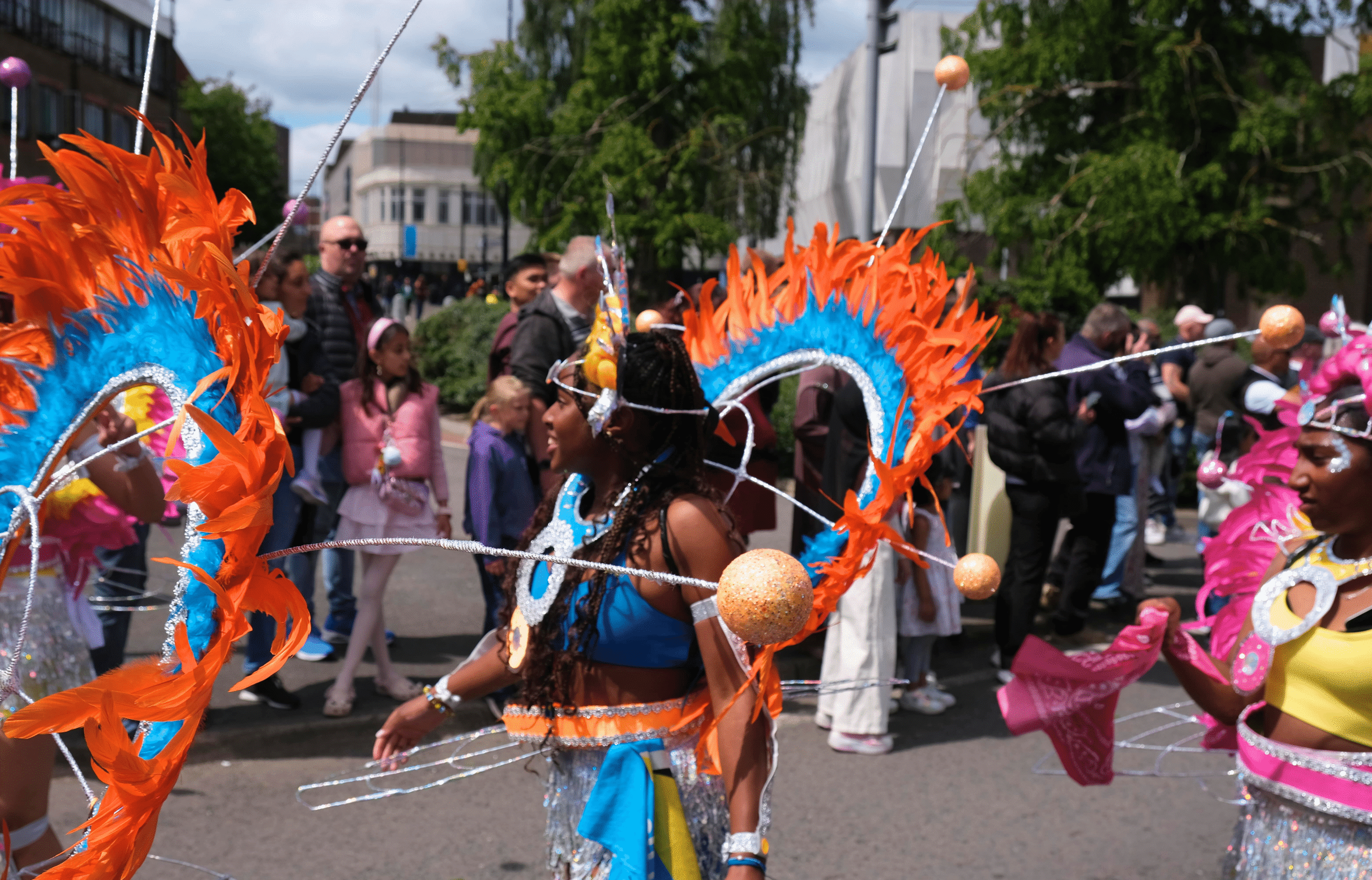 Women rocking handmade costumes inspired by the “Back to the Future” theme at Luton International Carnival on May 25, 2025.