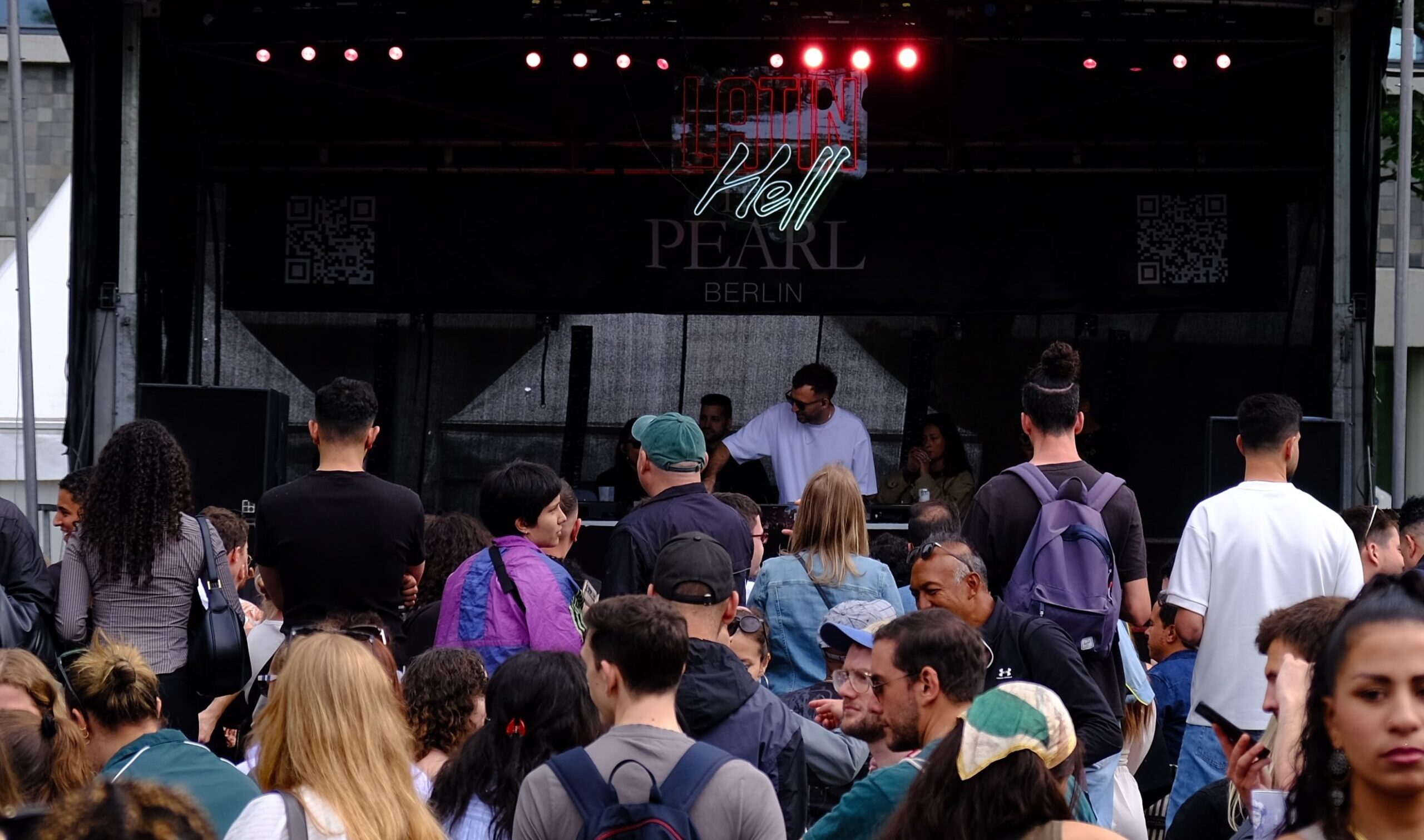 The “Latin Hell” booth at the festival leading up to Berlin Karneval der Kulturen 2025, showcasing Latin music, culture, and community vibes.