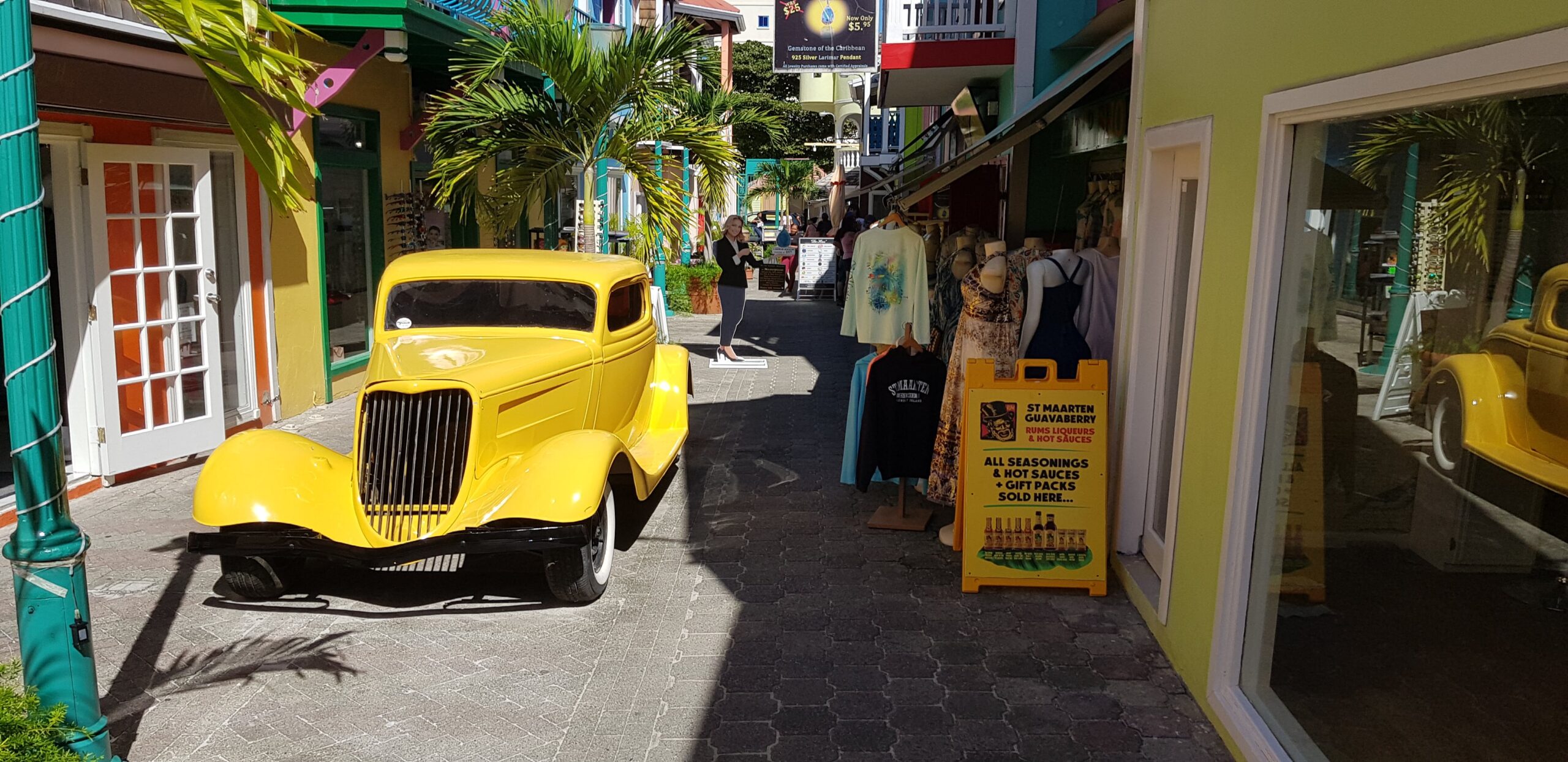 Yellow car parked along Back Street in Philipsburg, Sint Maarten — capturing local island life ahead of SXM Carnival 2026.