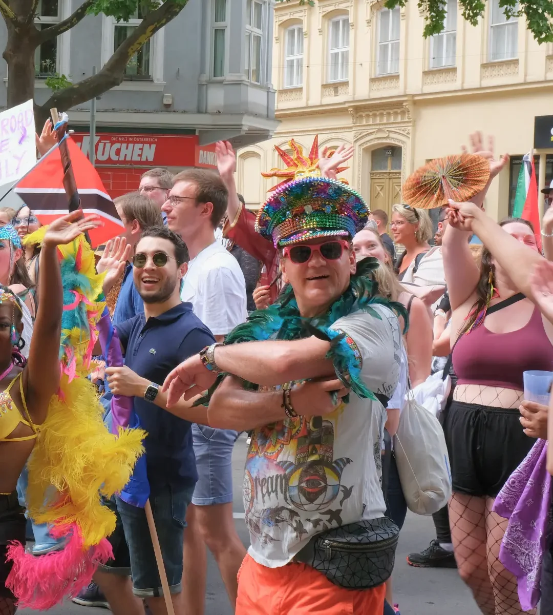 Happy revelers posing for photos during the Vienna Carnival, capturing the friendly, festive spirit of carnival in Austria