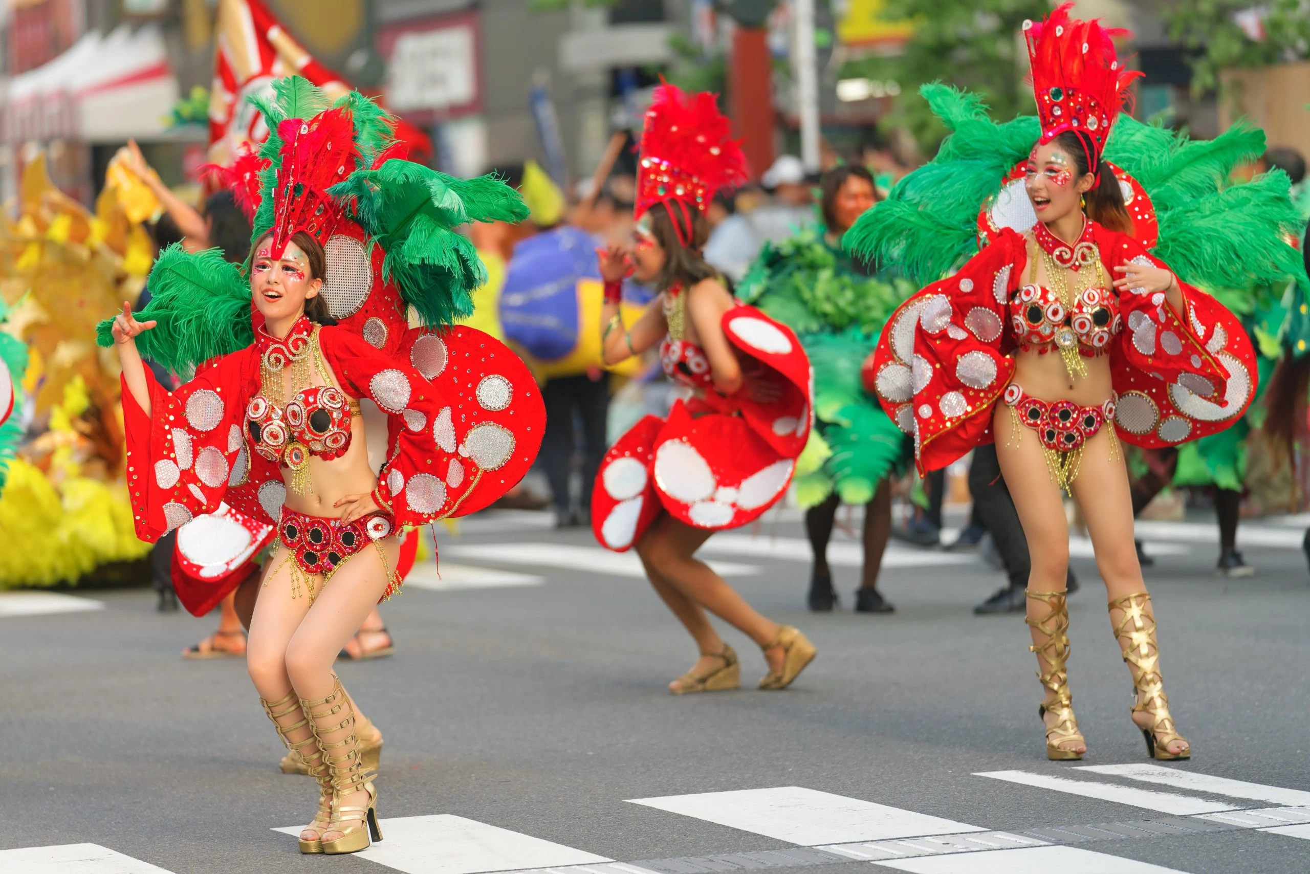 Troupe dancing in red mushroom-inspired costumes at the Asakusa Samba in Tokyo