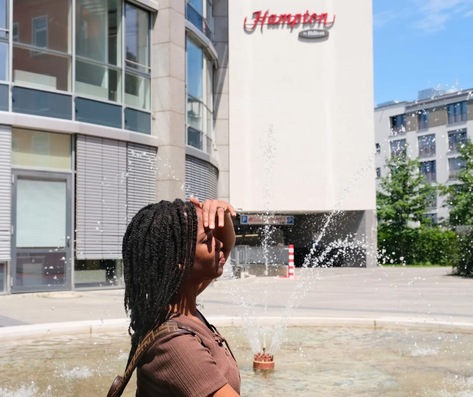 Shelley from Carnival Vibez relaxing near Hampton by Hilton Munich City West, a hotel option for Munich Carnival 2026 visitors