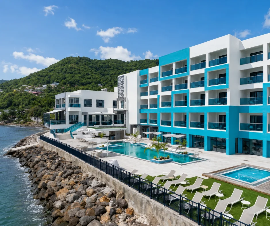 Oceanfront pool deck at Ocean Oasis Hotel Dominica in Castle Comfort, a beachfront choice among Dominica Carnival hotels a mile south of Roseau.