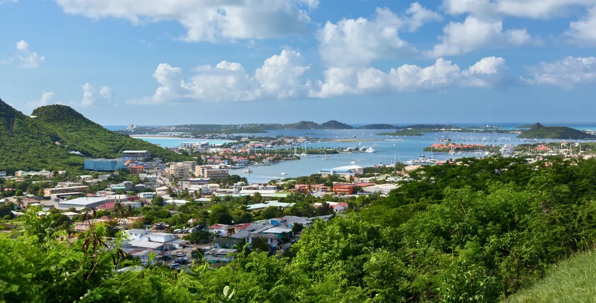 View over Simpson Bay and the Caribbean Sea in Sint Maarten, a popular area to stay for SXM Carnival
