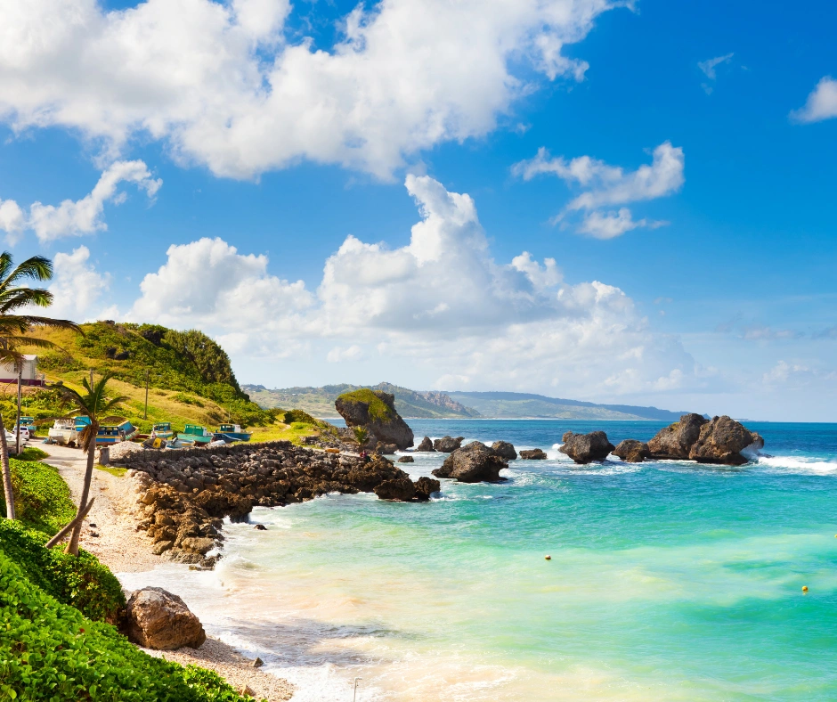 Bathsheba Beach on Barbados' east coast with dramatic rock formations and turquoise waves.