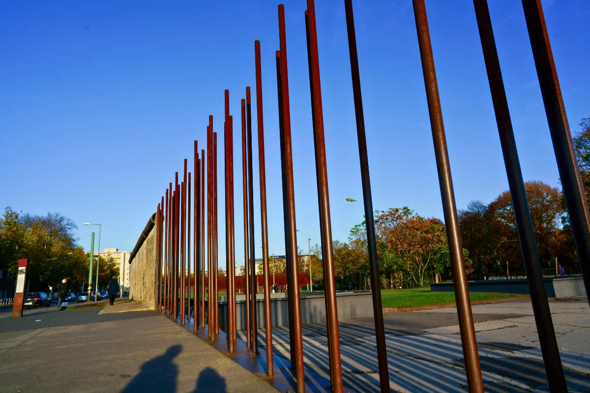 Rusted steel rods marking the former border line at the Berlin Wall Memorial on Bernauer Strasse