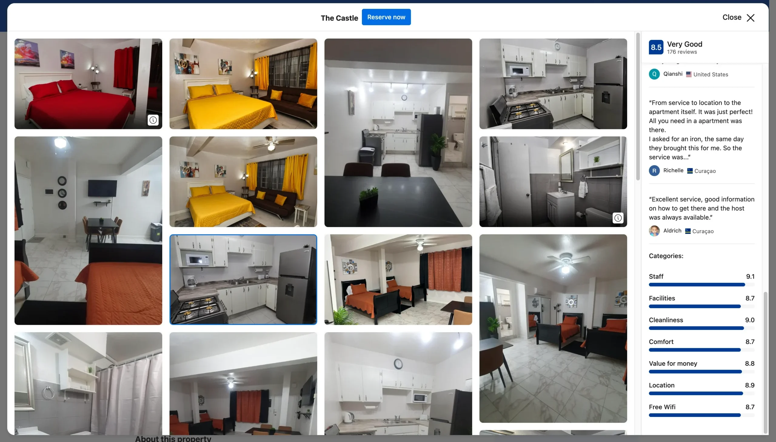 The Castle apartment in Philipsburg, St. Maarten, showing a furnished bedroom, kitchen and living space for visitors deciding where to stay for SXM Carnival